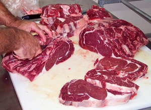 Slicing 1-1/4" thick Cutrer's Ribeye Steak
